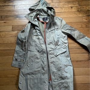 Cole Haan trench rain coat. Light tan with iridescent shine. Size medium
